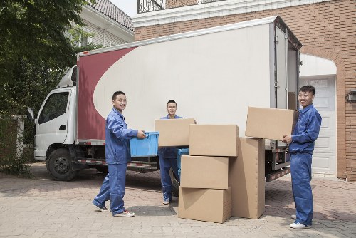 Man with van helping with office and home relocation in West Kensington