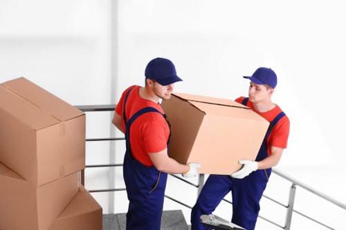 West Kensington movers handling boxes and furniture with care
