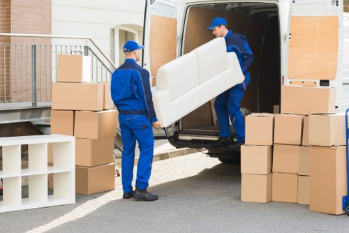 Removal company packing fragile items for transport in West Kensington