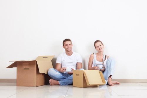 Local removalists handling furniture and boxes near West Kensington streets