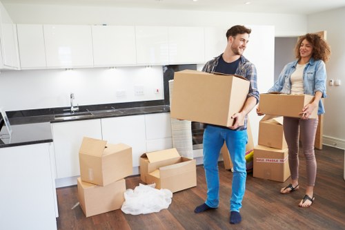 Professional movers handling furniture during a Westkensington house removal