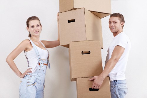 Careful handling of household belongings during a West Kensington relocation